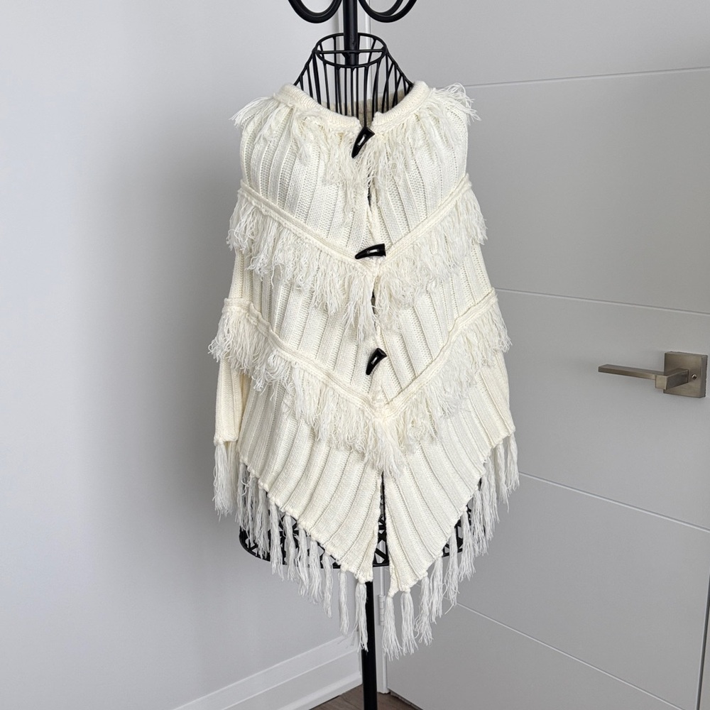 Elegant Cream Poncho with Fringe Details